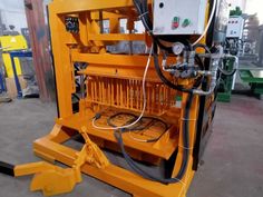 Machine a parpaing, machine de bloc béton, pondeuse parpaing, presse a parpaing, machine de fabrication de brique, machine parpaing